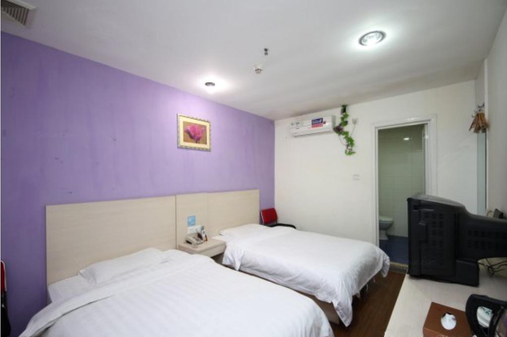 Yixin Business Hotel Гуанчжоу Экстерьер фото