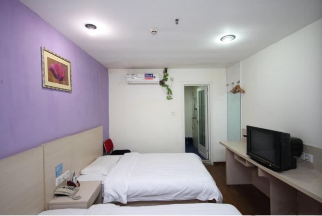 Yixin Business Hotel Гуанчжоу Экстерьер фото