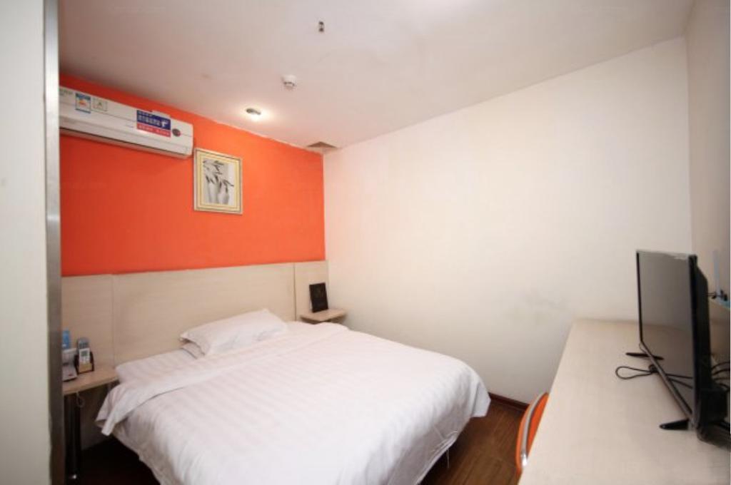 Yixin Business Hotel Гуанчжоу Экстерьер фото