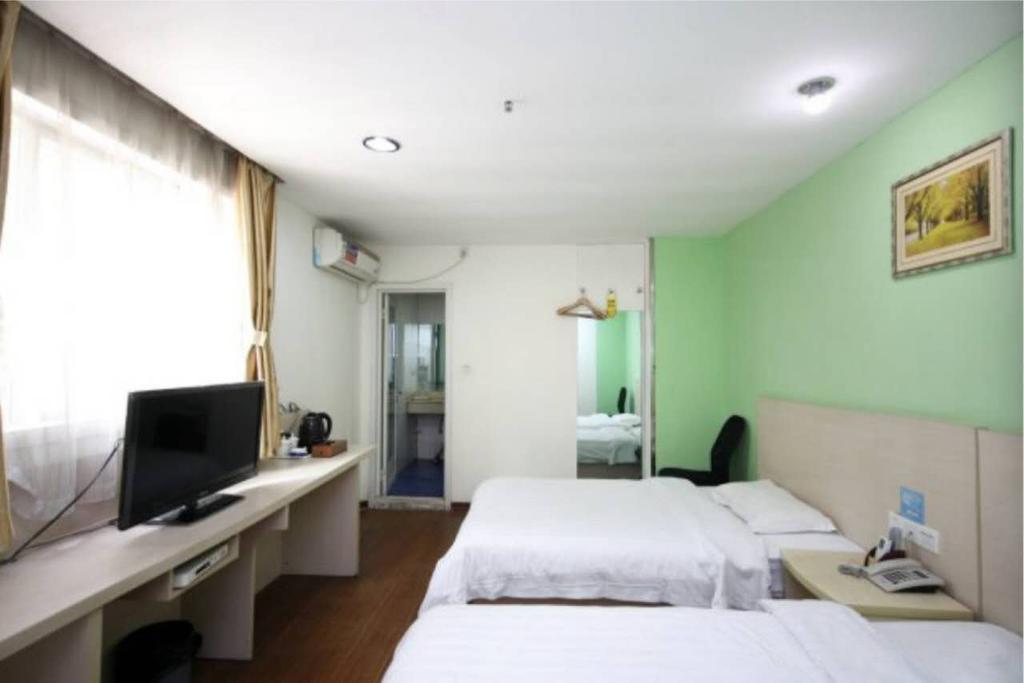 Yixin Business Hotel Гуанчжоу Экстерьер фото