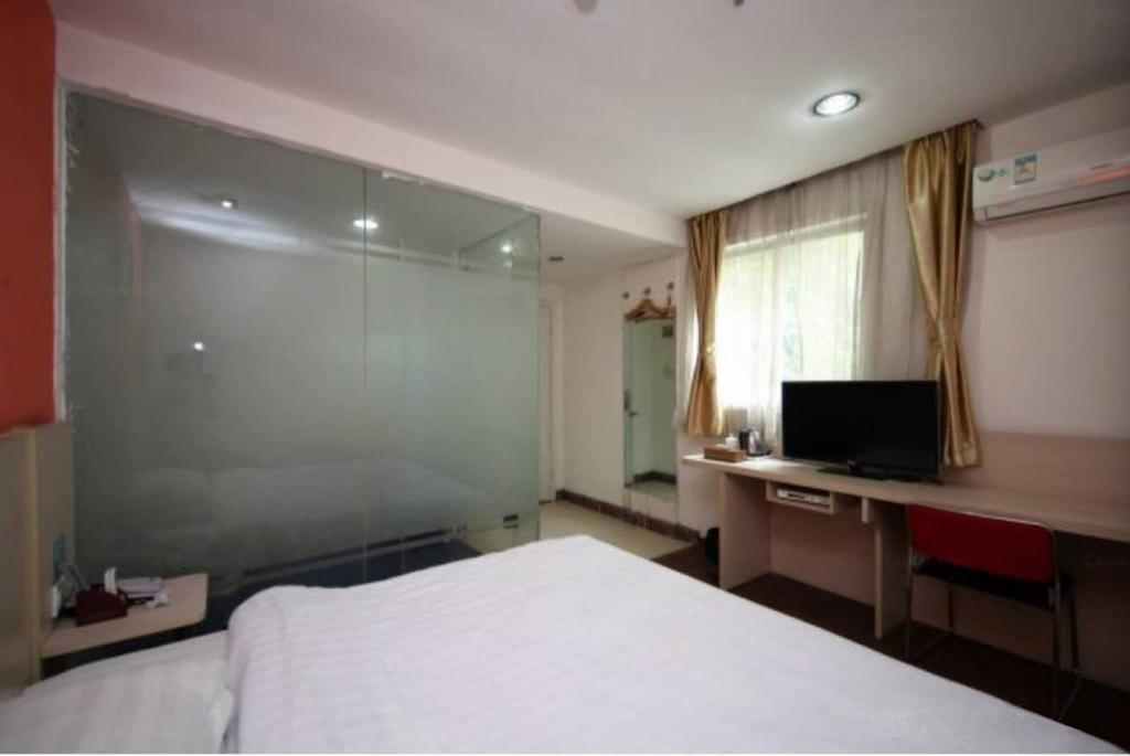 Yixin Business Hotel Гуанчжоу Экстерьер фото