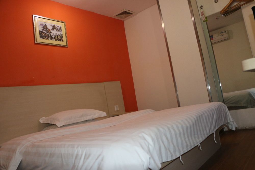 Yixin Business Hotel Гуанчжоу Экстерьер фото